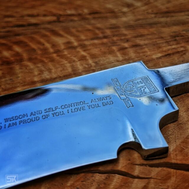 I finished the custom etching on the Warrior Heart blade I am working on. 

This was probably the most nerve wrecking step as it is easy to ruin so many hours of work in just some seconds.

All came out perfectly and after the final polish the etching is crispy sharp to read.

The words follow the wave of the grind line of the primary bevel and are adressed to the son. I also etched the family crest on the ricasso. This knife will be something very special.

#heirloom #knife #WarriorHeart #bowie #bowieknife #bowiemesser #fighterstyle #fighter #simplyknives #customknife #customknives #knifefanatics #metalwork #knifestagram #artisan #knifemaker #knife #cutlery #knifeporn #bladesmith #bladesmithing #knives #handmade #diy #knifemaking #messer #handarbeit #handwerk